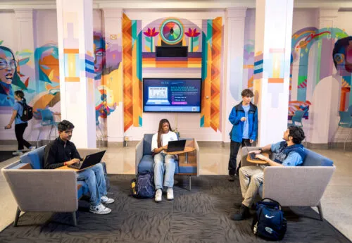 Student study in the SILS atrium.