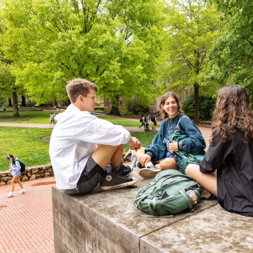 Students hang out in front of Wilson Library on Polk Place on April 14, 2023, on the campus of the University of North Carolina at Chapel Hill.