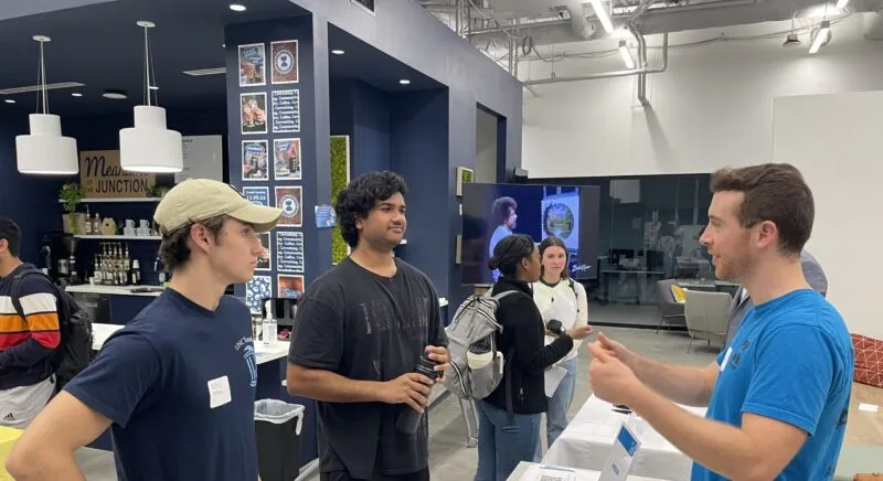 Three students speaking at an Innovate Carolina event
