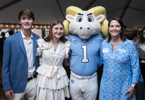 The Kitchens Family poses for a photo with Ramses Jr.