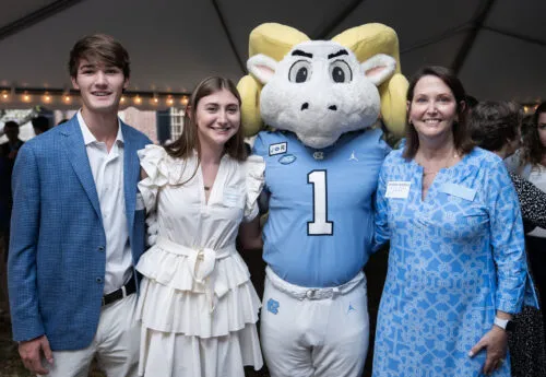 The Kitchens Family poses for a photo with Ramses Jr.