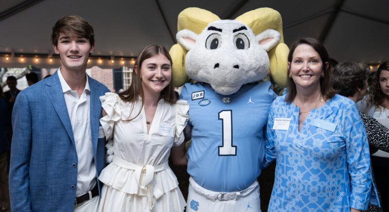 The Kitchens Family poses for a photo with Ramses Jr.