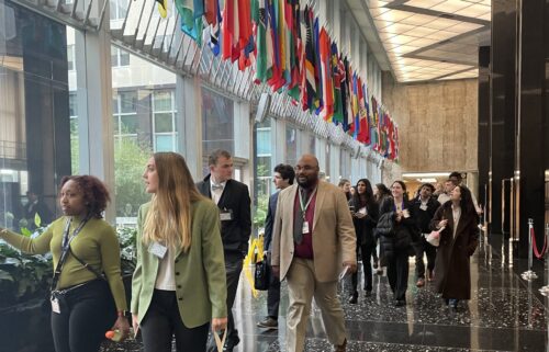 Students walk the halls of the U.S. Department of State for a Foreign Policy Classroom session.