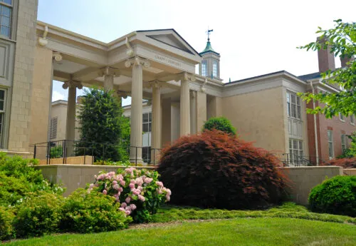 The lawn, shrubs, and front of the Knapp-Sanders Building