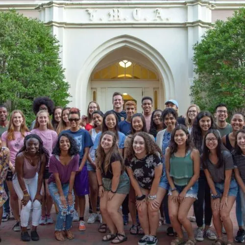 A group of students outside of the Campus Y building