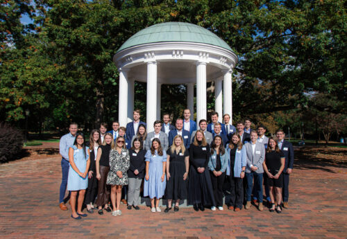 Group photo of the 2023 Young Alumni Leadership Council (YALC) on October 20, 2023 at the Old Well on the campus of UNC-Chapel Hill in Chapel Hill, NC.