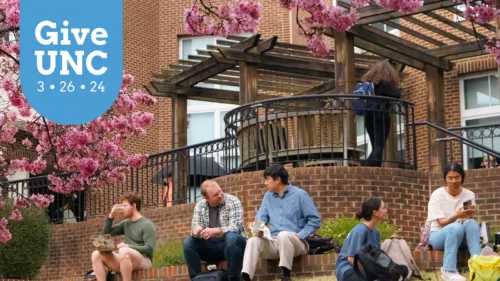 GiveUNC 3.26.24 students outside of the Law School building on a spring day
