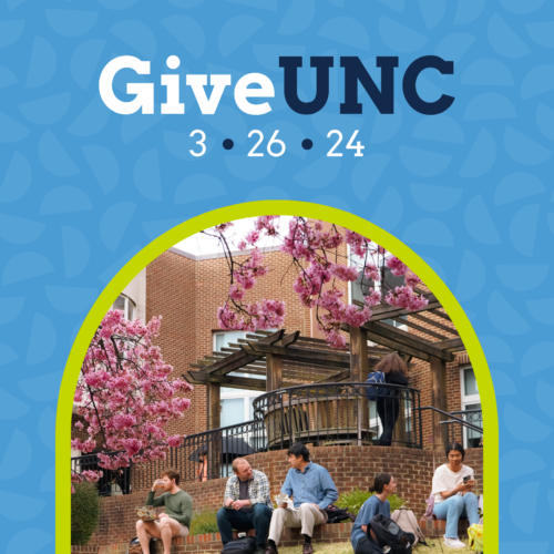 GiveUNC 3.26.24 students sit outside in the spring