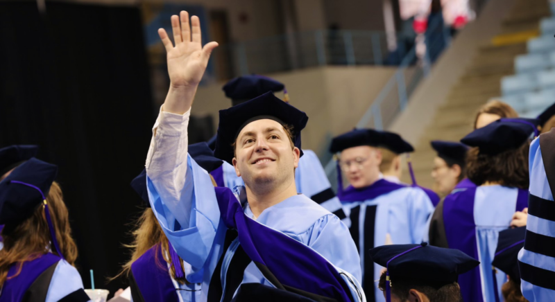 Law student waves at graduation