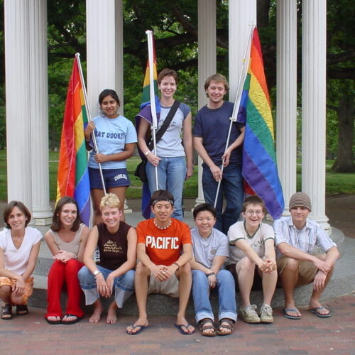 LGBTQ Student Leadership group poses in front of the Old Well