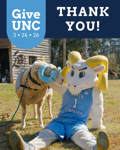 Rameses the mascot sitting with Rameses the ram