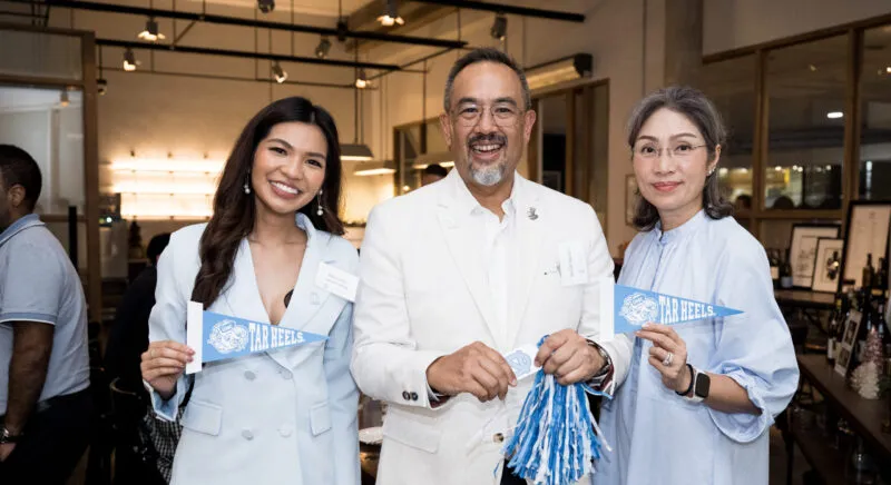 Tar Heel Global Network Members Pose with UNC Swag